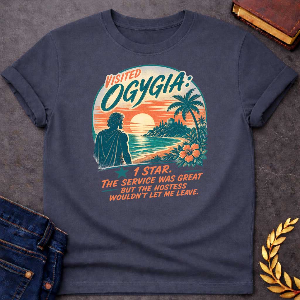 Dark Heather T-Shirt with a vintage travel poster parody featuring Ogygia from Homer's Odyssey. A silhouetted figure in Greek robes gazes at a tropical paradise island at sunset with palm trees and hibiscus flowers. Text reads 'VISITED OGYGIA' in teal and coral, with a humorous one-star review: 'THE SERVICE WAS GREAT BUT THE HOSTESS WOULDN'T LET ME LEAVE.' References Odysseus held captive by Calypso. Mimics retro mid-century travel ads with distressed texture in teal, coral, cream, and peach tones.