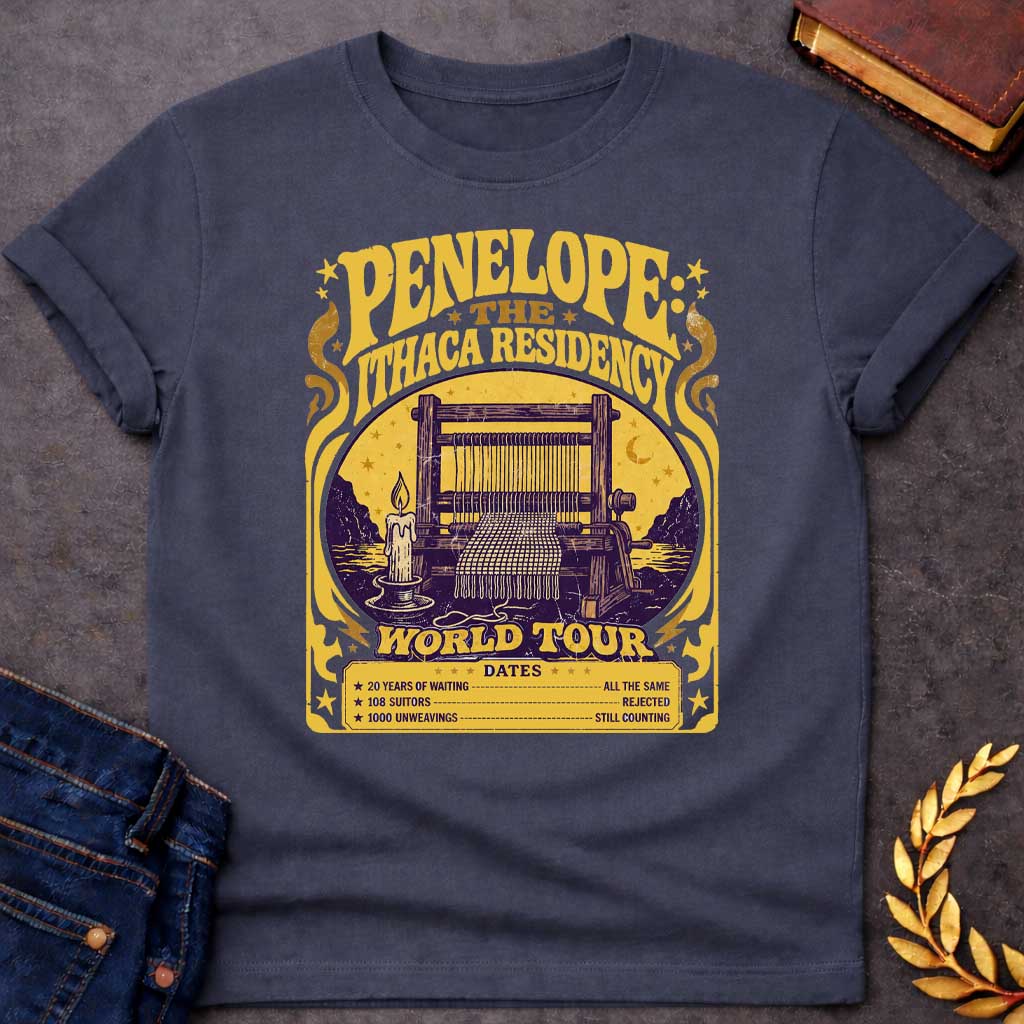 Dark Heather T-Shirt with a vintage concert poster parody in purple and gold featuring Penelope's loom. Text reads 'PENELOPE: THE ITHACA RESIDENCY' and 'WORLD TOUR' in distressed lettering. Central image shows a wooden loom with candle against a golden circular backdrop with cypress trees. Humorous tour dates list: '20 YEARS OF WAITING - ALL THE SAME', '108 SUITORS - REJECTED', '1000 UNWEAVINGS - STILL COUNTING.' Art Nouveau-style design with decorative flourishes references Penelope's faithful waiting in T