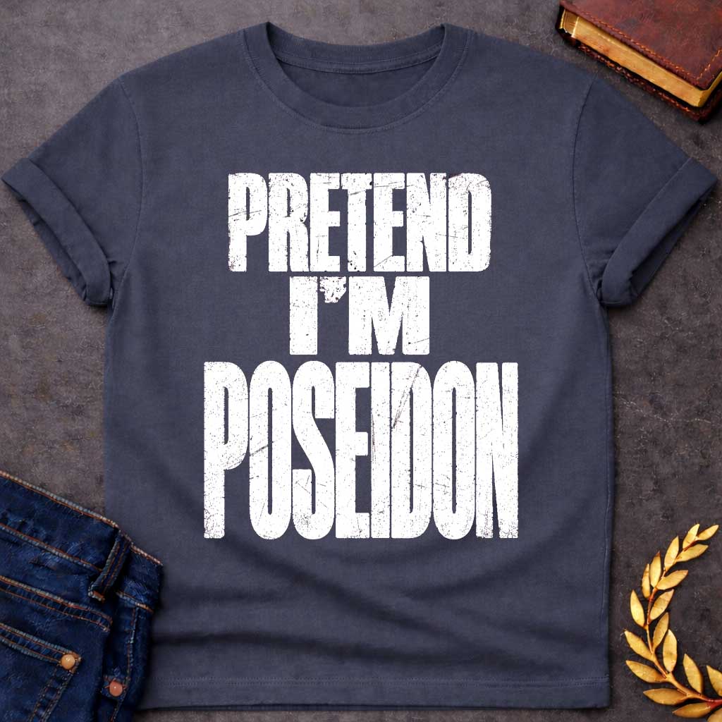 Dark Heather t-shirt with a Pretend I’m Poseidon Greek mythology design featuring bold distressed white typography on a transparent background. The stacked text reads “PRETEND I’M POSEIDON” in a rugged vintage block font, creating a humorous design inspired by Poseidon, the Greek god of the sea, storms, earthquakes, and horses.
