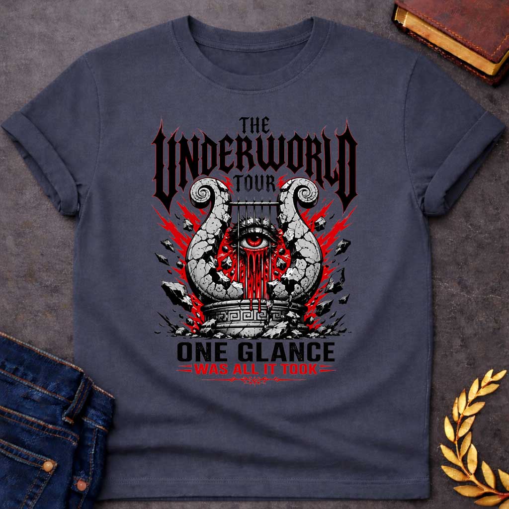Dark Heather t-shirt in heavy metal band-poster style: a cracked stone lyre with a bleeding red eye at its center sits atop a Greek pedestal, framed by jagged red lightning bolts and scattered rubble. Gothic spiked black lettering and bold red accent text complete the design