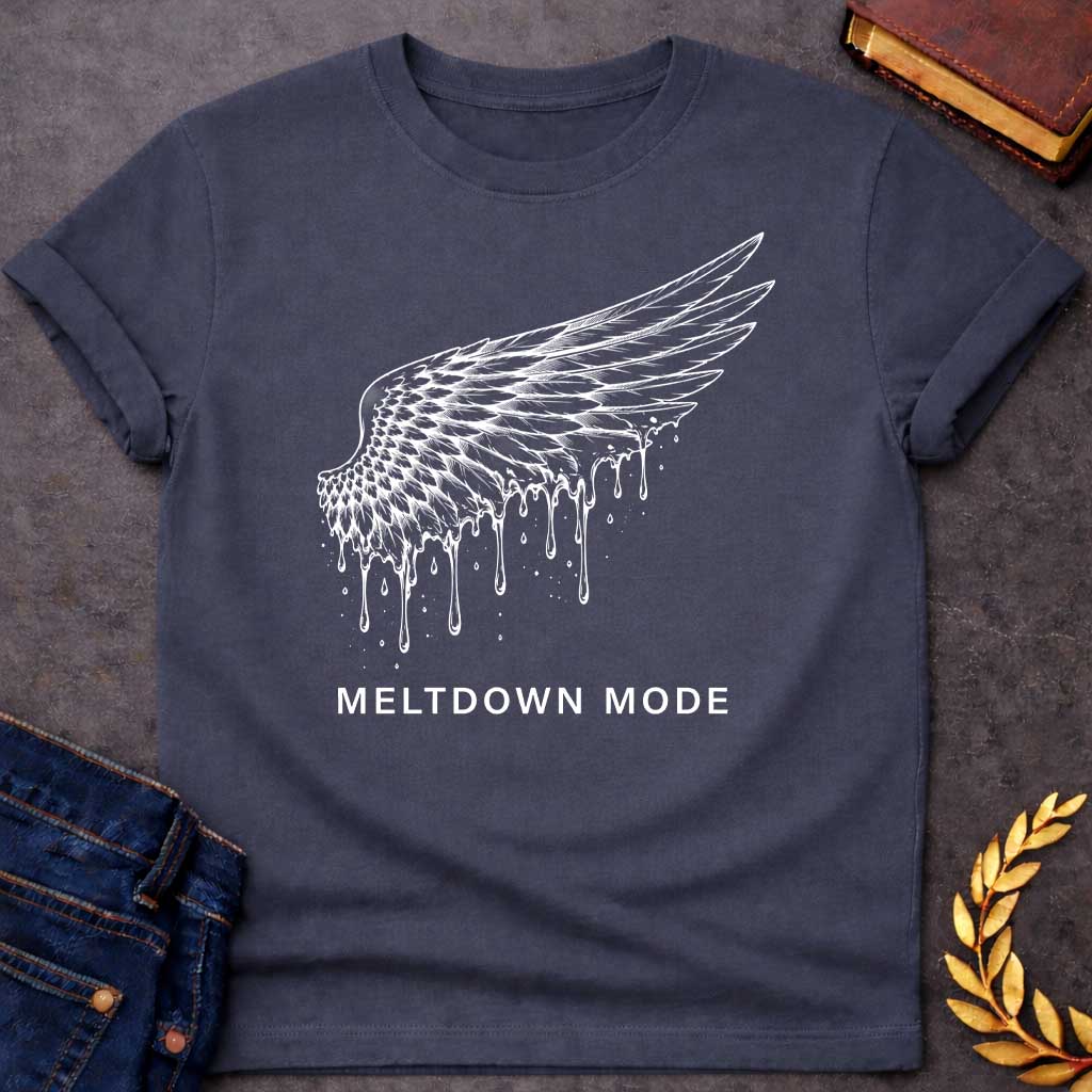 Dark Heather t-shirt with a minimalist, detailed line-art design. A single feathered wing, inspired by the myth of Icarus, stretches upward as wax drippings and droplets melt away from its bottom edge. Centered beneath the illustration, bold white text reads "MELTDOWN MODE" in a clean, spaced-out sans-serif font.