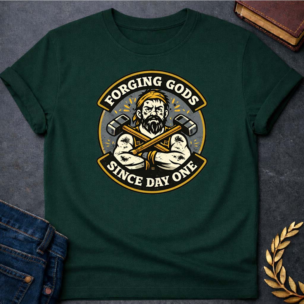hephaestus forging gods since day one greek mythology adult t shirt featuring blacksmith hammer, forge sparks, fire god symbolism in industrial mythology design