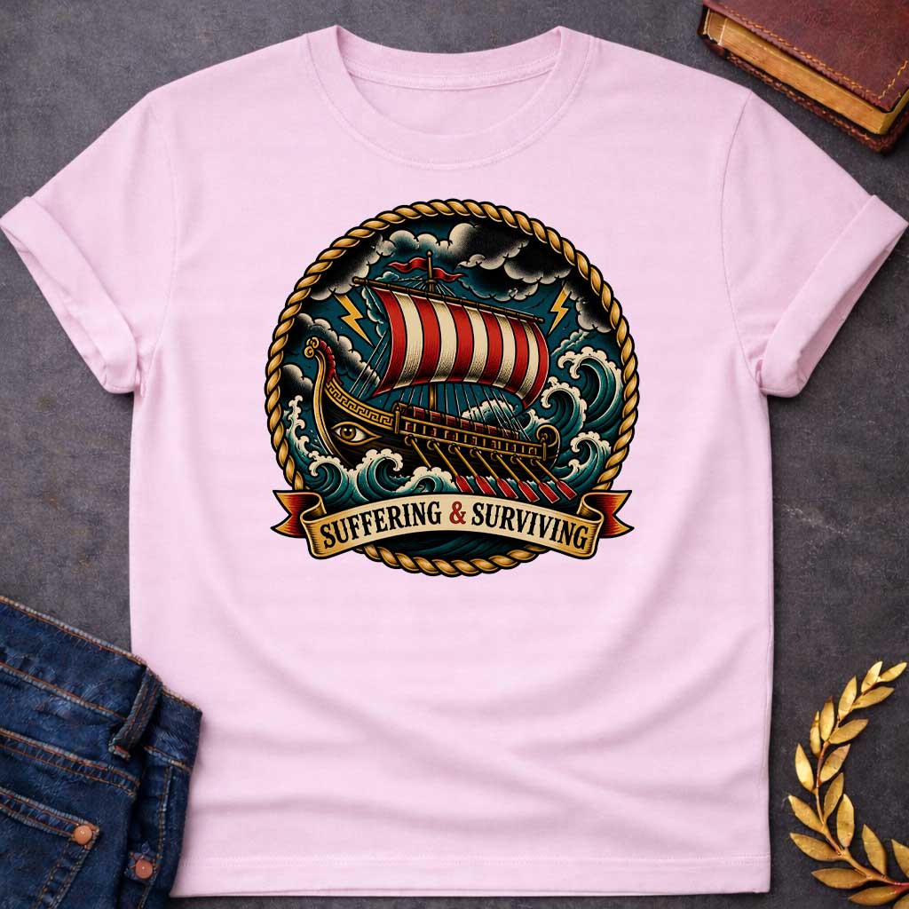 Light Pink T-Shirt with a traditional tattoo-style illustration of a Greek warship battling through a storm at sea, enclosed in a circular rope border. The vessel features an eye on its dark hull, red and cream striped sail, and multiple oars. The ship navigates turbulent teal waves under stormy skies with yellow lightning bolts. A ribbon banner reads 'SUFFERING & SURVIVING.' Rendered in bold vintage tattoo aesthetic with deep teals, reds, golds, and blacks, emphasizing perseverance through adversity.