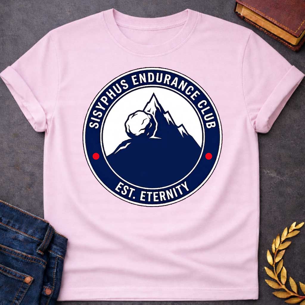 Light Pink T-Shirt with a circular, emblem-style graphic design. The center features a dark blue silhouette of a mountain with a large boulder resting near the peak. Surrounding this illustration is a dark blue ring with white text that reads "SISYPHUS ENDURANCE CLUB" arched at the top and "EST. ETERNITY" at the bottom, with two small red dots separating the text on the sides.
