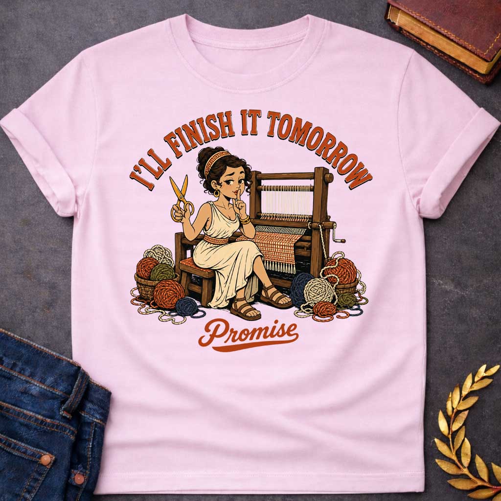 Light Pink T-Shirt with a humorous cartoon of Penelope at a wooden loom, holding scissors and making a 'shh' gesture. She wears a cream chiton with Greek key pattern belt, with curly brown hair. Baskets of colorful yarn surround her. Text reads 'I'LL FINISH IT TOMORROW' above and 'Promise' below. Comedic reference to Penelope's famous delaying tactic of weaving and unweaving her shroud to avoid suitors, reframed as modern procrastination humor