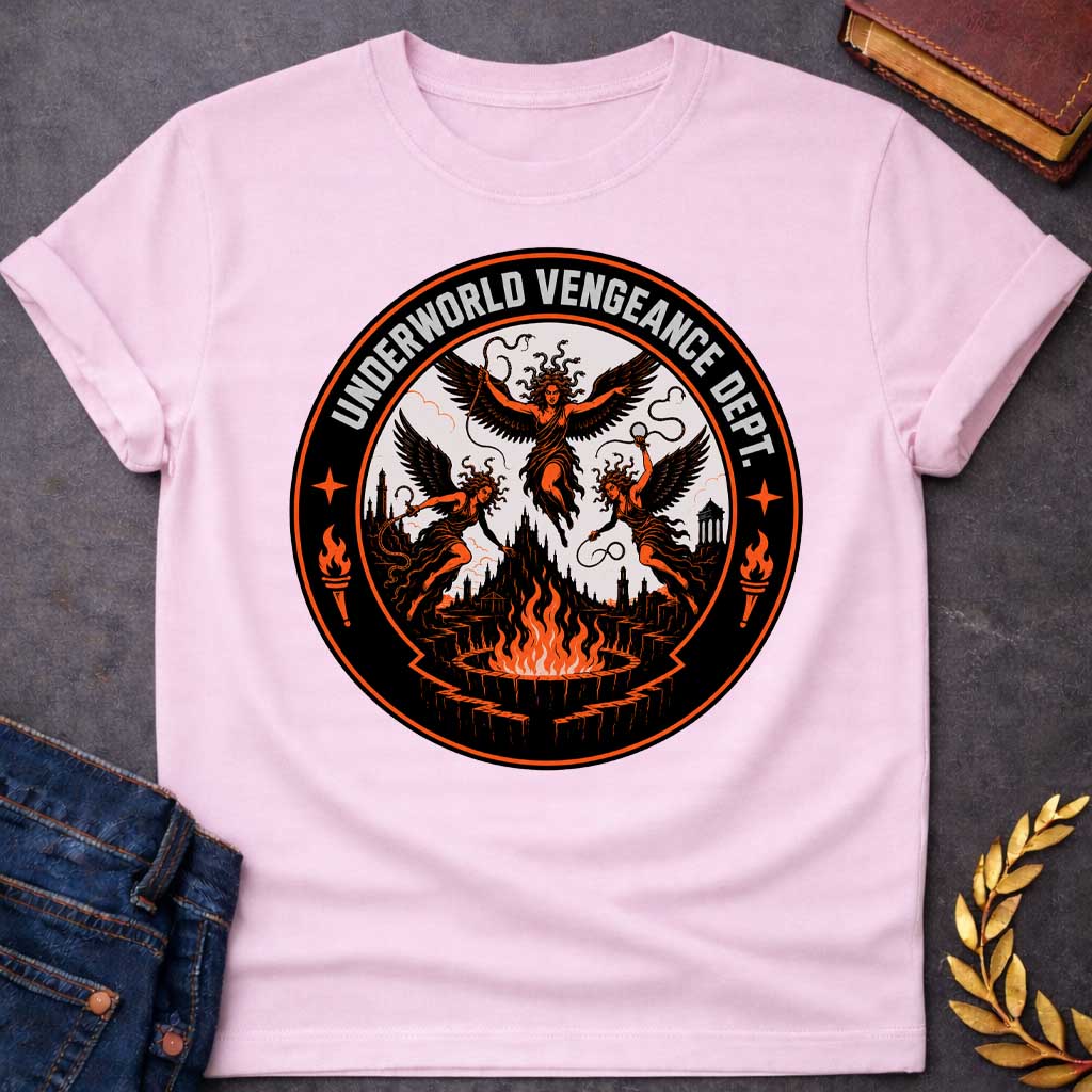 Light Pink T-shirt with an Official seal for the 'Underworld Vengeance Department,' a parody blending Greek mythology with government bureaucracy. Three winged Furies with serpent hair occupy the center in orange and black. A dark gothic underworld landscape with towers sprawls below. Large flaming torches frame the design. Four-pointed stars accent the circular seal border. Black, orange, and cream colors create an official emblem celebrating divine vengeance as institutional authority.