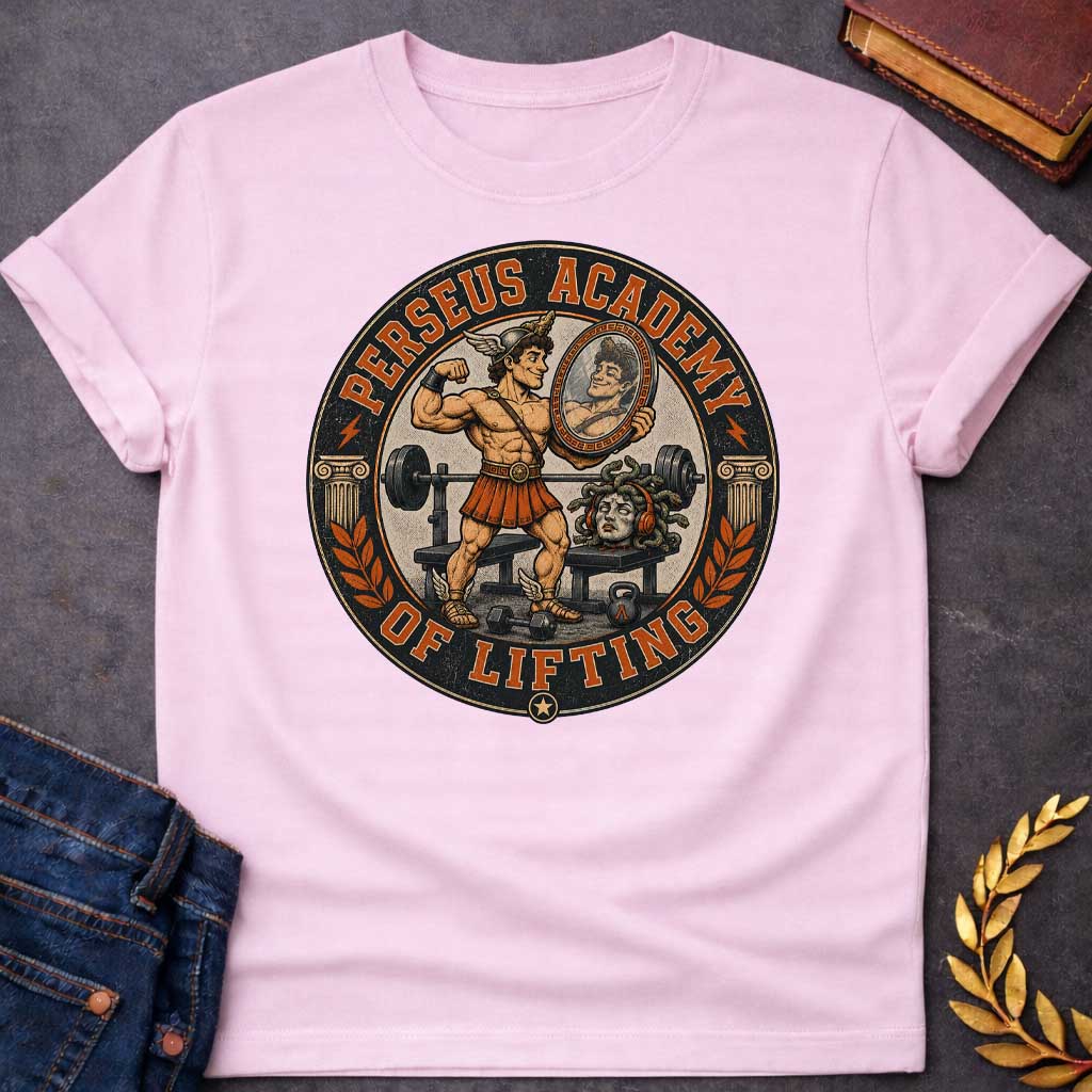 Light Pink T-shirt in vintage badge style: a winged-helmet Perseus flexes his bicep in a gym, admiring himself in a hand-held mirror, wearing a bronze breastplate, kilt, and winged sandals. Behind him sits a barbell bench, dumbbells, and a kettlebell. Medusa's severed head rests on a bench wearing orange headphones, snake hair coiled. Ionic columns and laurel branches frame the circular black-and-orange design.