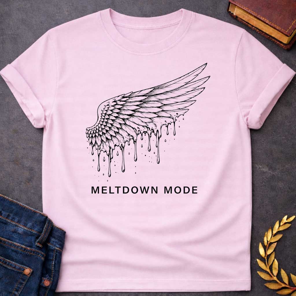 Light Pink t-shirt with a minimalist, detailed line-art design. A single feathered wing, inspired by the myth of Icarus, stretches upward as wax drippings and droplets melt away from its bottom edge. Centered beneath the illustration, bold black text reads "MELTDOWN MODE" in a clean, spaced-out sans-serif font.