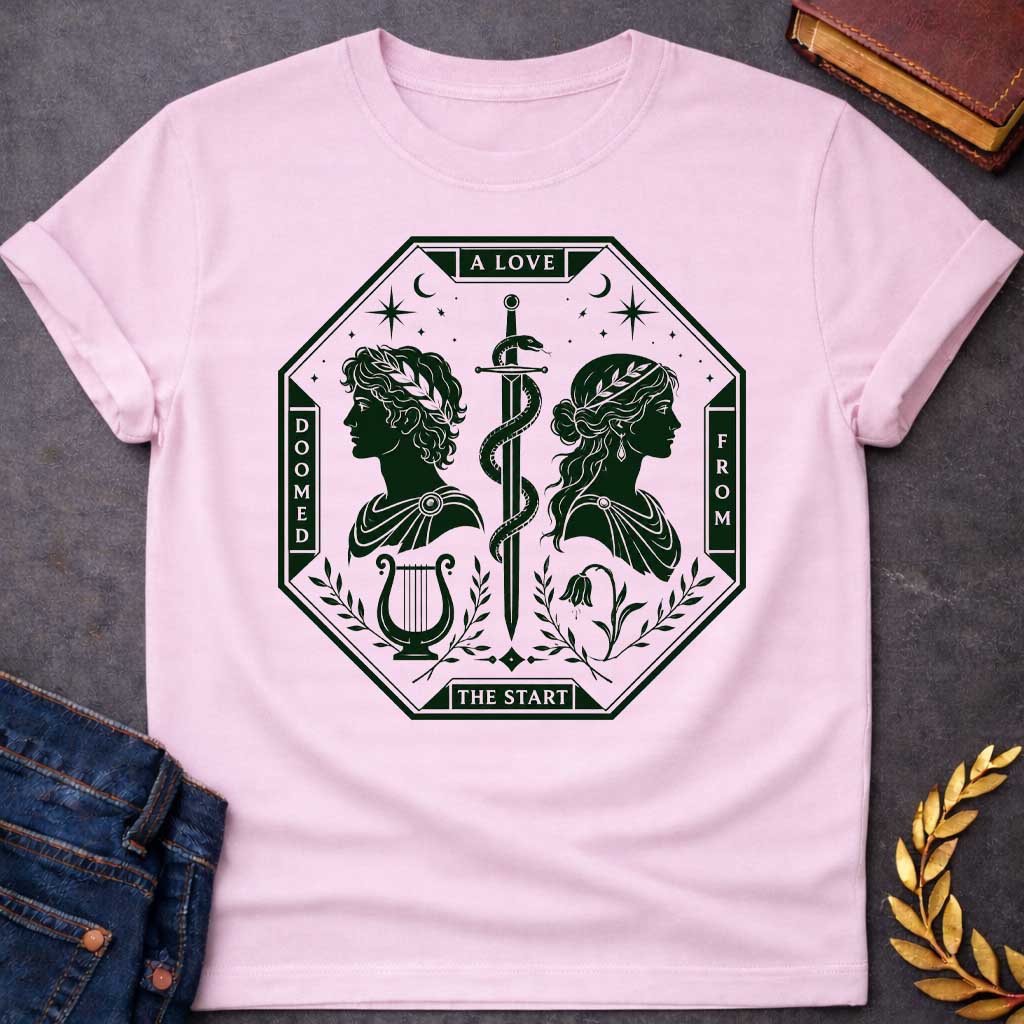 Light Pink t-shirt in dark green tarot-card style: an octagonal frame shows two facing silhouette profiles (a laurel-crowned man and a woman with a headband) separated by a snake-entwined sword. Below them sit a lyre and a drooping flower, framed by olive branches, stars, and crescent moons, evoking Orpheus and Eurydice.