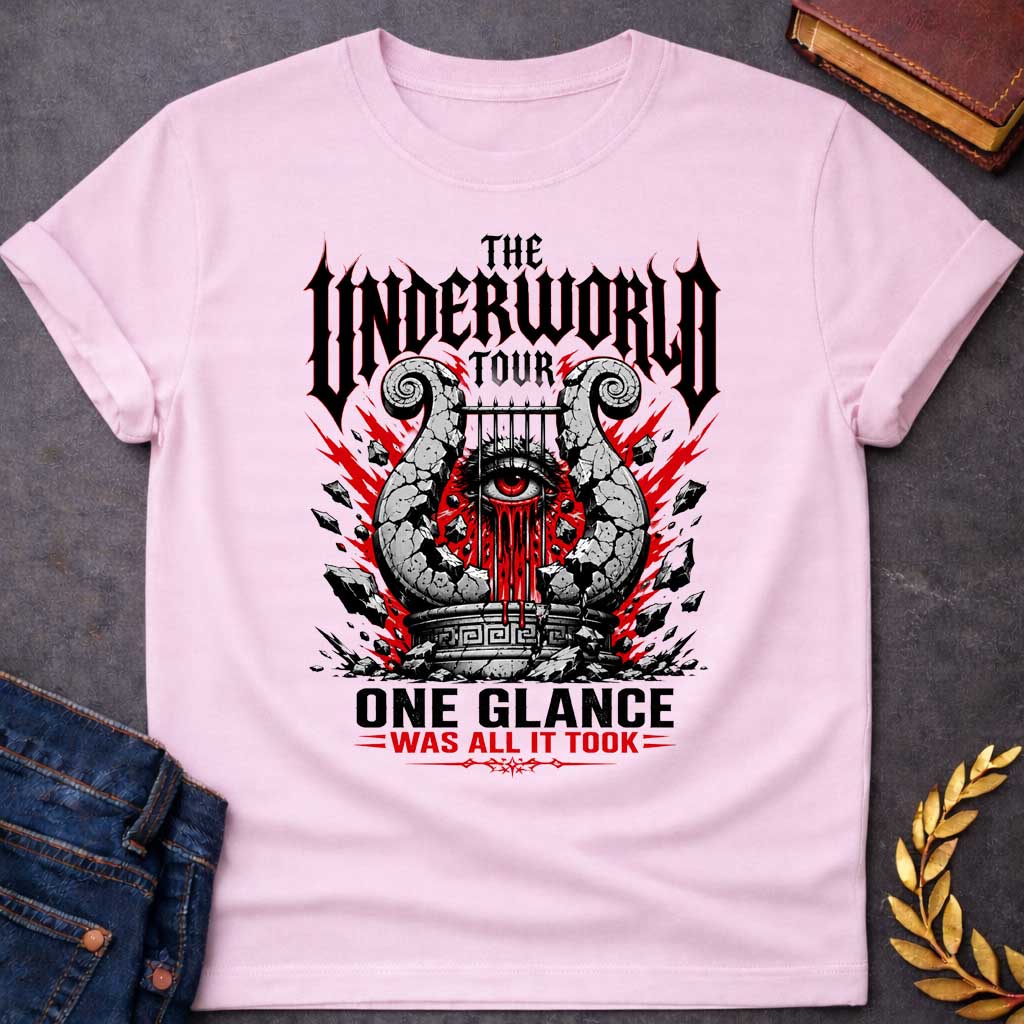 Light Pink t-shirt in heavy metal band-poster style: a cracked stone lyre with a bleeding red eye at its center sits atop a Greek pedestal, framed by jagged red lightning bolts and scattered rubble. Gothic spiked black lettering and bold red accent text complete the design