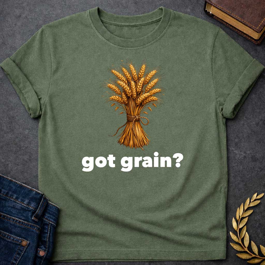 Military Green T-shirt graphic featuring a detailed realistic illustration of a golden wheat sheaf tied together with a twisted rope bow, set against a white background, with bold black text below reading "got grain?" in a humorous nod to Demeter, Greek Goddess of the Harvest