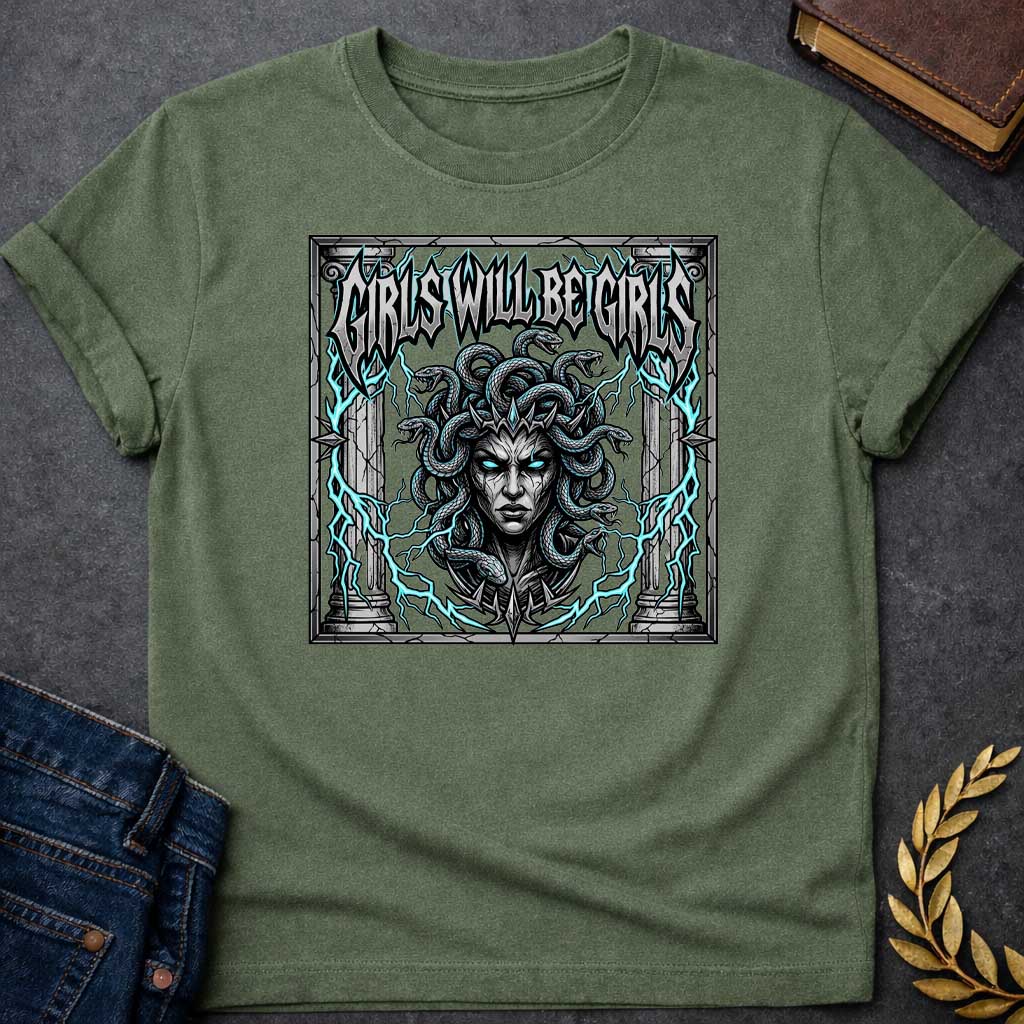 Military Green T-shirt graphic in a dark heavy metal style featuring a fierce front-facing illustration of Medusa with glowing teal eyes, a spiked crown, and writhing snakes for hair, surrounded by electric teal lightning bolts and flanked by cracked stone Greek columns, all within a crumbling stone frame. Bold metallic gothic lettering across the top reads "Girls Will Be Girls,"