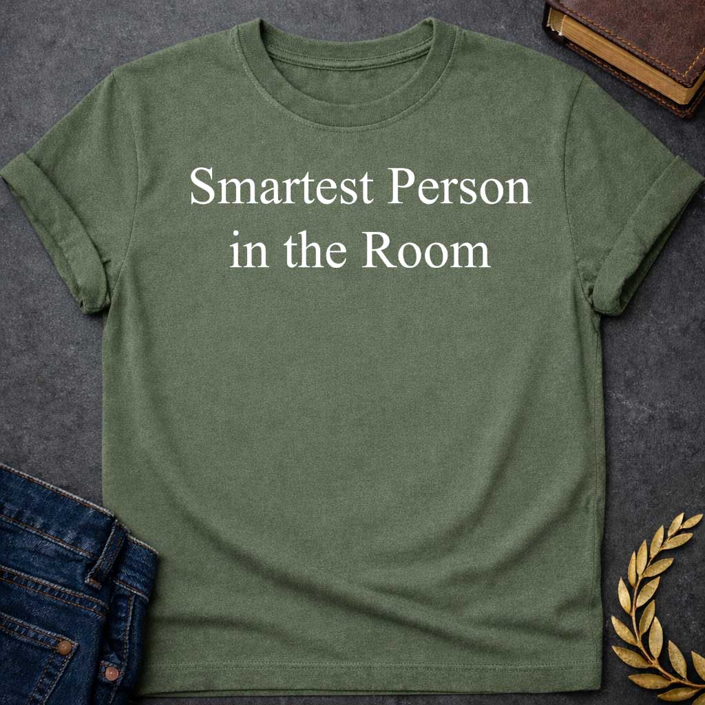 Military Green T-shirt graphic in white featuring large elegant serif text reading "Smartest Person in the Room" — a confident nod to Athena, the Greek Goddess of Wisdom