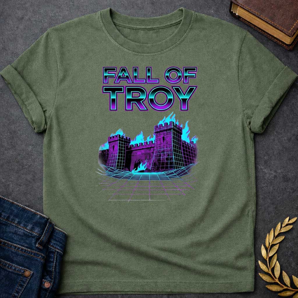 Military Green T-shirt featuring bold chrome 3D outlined text reading "Fall of Troy" above a retro vaporwave-style illustration of the burning city of Troy depicted as a purple halftone castle engulfed in bright teal flames, set on a glowing teal perspective grid floor — referencing the legendary fall of Troy from Greek mythology, rendered in a vivid 1980s retro synthwave aesthetic in purple and teal tones