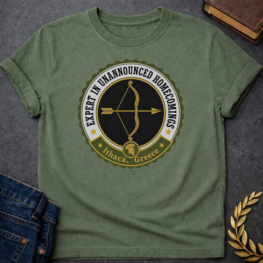 Military Green T-shirt with a graphic featuring a vintage military challenge coin-style badge design in olive green, black, gold, and white. A golden bow and arrow are centered on a black background within the circular badge, with text arched around the outer ring reading "Expert in Unannounced Homecomings" flanked by gold stars. A green ribbon banner at the bottom features a Spartan helmet medallion and reads "Ithaca, Greece" with gold stars — a humorous reference to Odysseus, the hero of Homer's Odyssey w