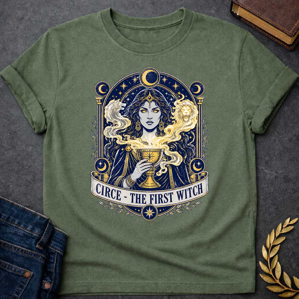 Military Green T-shirt with a Mystical tarot-style portrait of Circe, the first witch from Greek mythology, rendered in navy blue and gold. She displays golden glowing eyes and magical hair infused with light energy. Twin lion heads flank her head symbolizing divine power. She holds an ornate golden goblet overflowing with luminous magic. Moon phases in crescent form circle her ethereal figure. Ornate architectural frame with columns and celestial decorations. Gold stars scatter throughout. Banner reads 'Ci