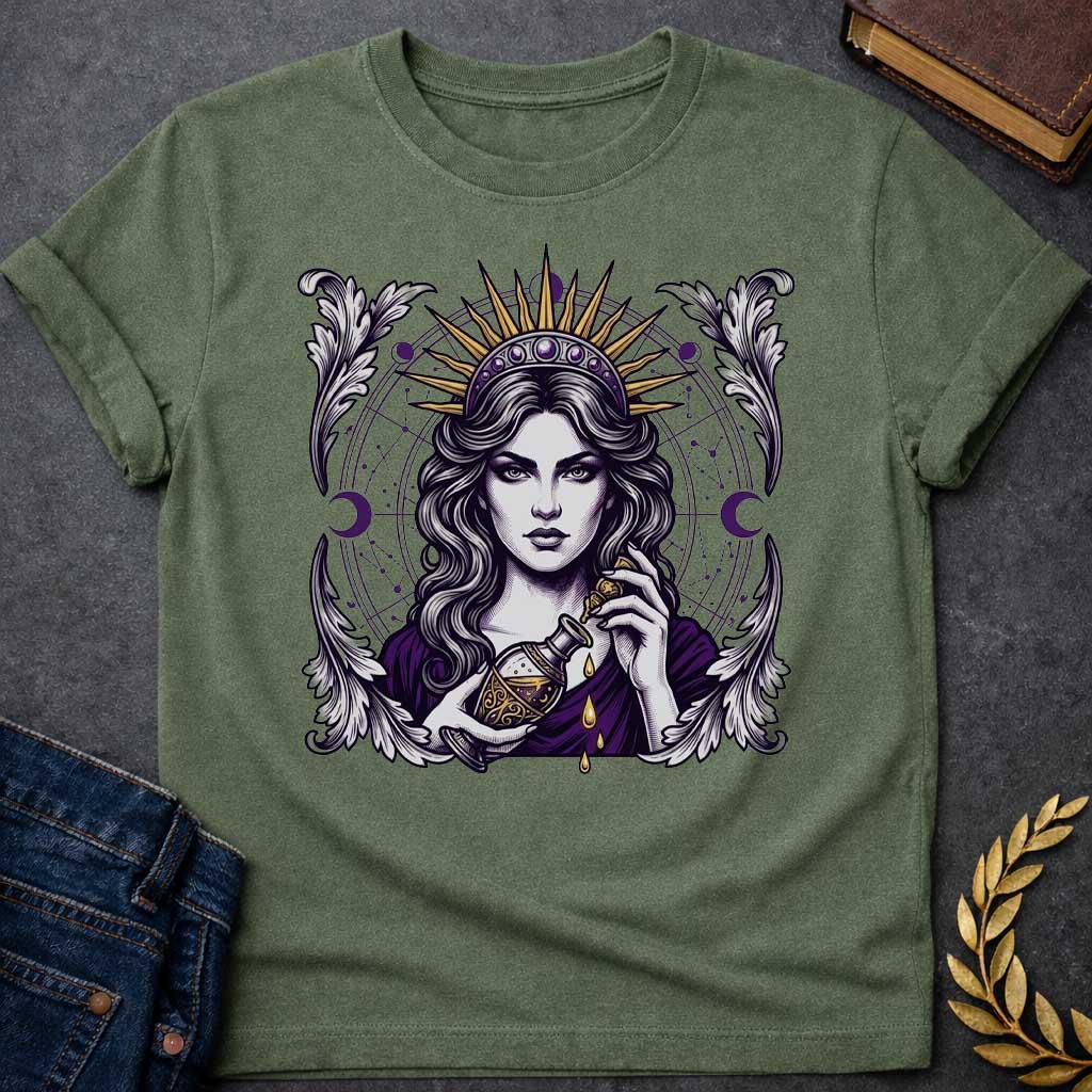 Military Green T-shirt with a Mystical portrait of Medea rendered in black, purple, and gold holding an ornate potion vessel with glowing liquid dripping downward. Elaborate celestial backdrop features a radiating golden sun crown, purple moon phases, and astrological constellation patterns surrounding her face. Ornate white wing designs frame the composition. Intricate occult aesthetic celebrates the legendary Greek sorceress's magical power, ancient wisdom, and mystical enchantment.