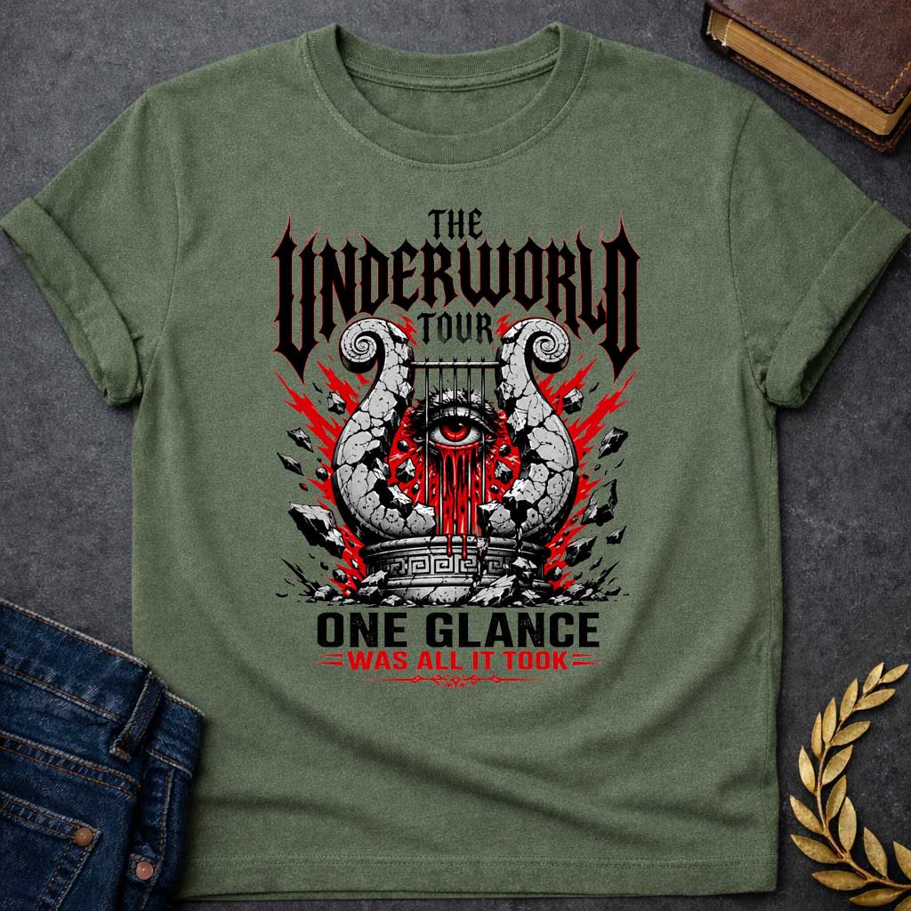 Military Green t-shirt in heavy metal band-poster style: a cracked stone lyre with a bleeding red eye at its center sits atop a Greek pedestal, framed by jagged red lightning bolts and scattered rubble. Gothic spiked black lettering and bold red accent text complete the design