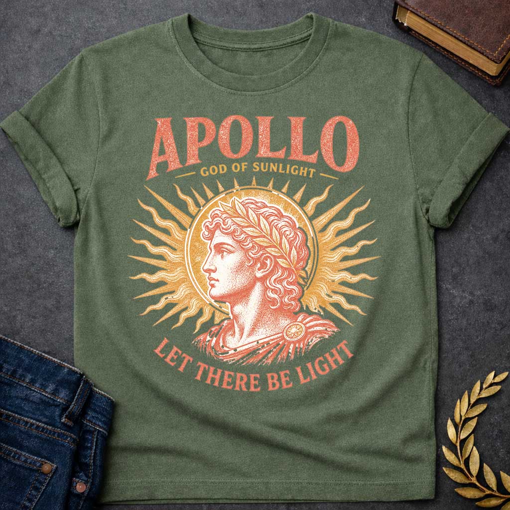 Military Green t-shirt with a Vintage Greek mythology design featuring Apollo, god of sunlight, in a classical portrait wearing a laurel crown. A radiant golden sunburst frames the god in warm coral and gold engraving-style artwork. Bold text reads "Apollo – God of Sunlight" and "Let There Be Light," celebrating the legendary Olympian god.