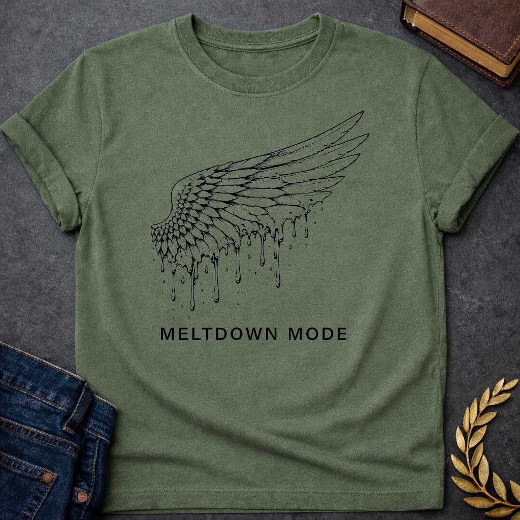 Military Green t-shirt with a minimalist, detailed line-art design. A single feathered wing, inspired by the myth of Icarus, stretches upward as wax drippings and droplets melt away from its bottom edge. Centered beneath the illustration, bold black text reads "MELTDOWN MODE" in a clean, spaced-out sans-serif font.