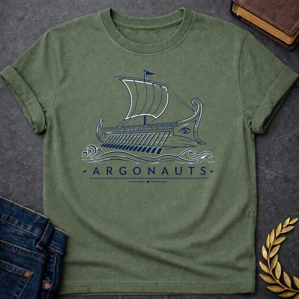 Military Green T-shirt with A Classical line art rendering of the legendary Argo in navy blue. The Greek ship features billowing sails above a detailed hull with visible oars. Ornate bow and stern decorations frame a protective eye symbol on the hull. Decorative waves flow beneath. Text reads 'Argonauts' with diamond accents. Celebrates the heroic quest of Jason and his crew seeking the golden fleece in ancient Greek mythology.