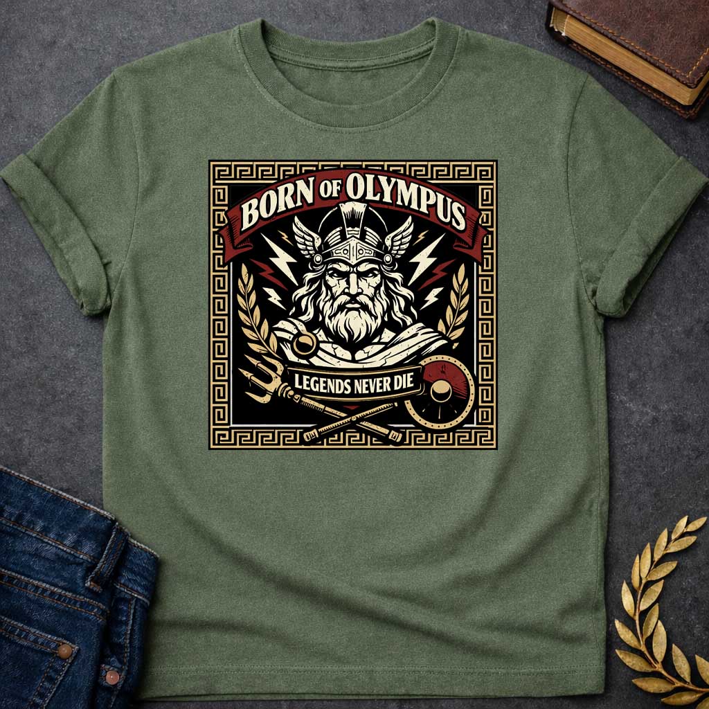 Military Green T-shirt graphic featuring a bold vintage label-style design with a Greek meander border in gold. A red arched banner at the top reads "Born of Olympus" above a front-facing illustration of Zeus with long white hair and beard wearing a winged helmet, surrounded by radiating lightning bolts and flanked by golden laurel branches. A crossed trident and scepter with a red shield sit below, with a scroll banner reading "Legends Never Die," rendered in black, gold, cream, and red tones