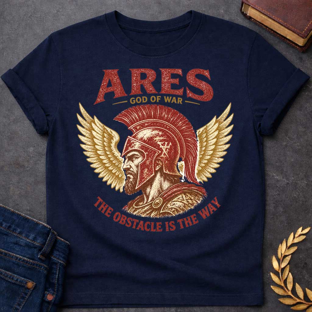 Navy t-shirt with a Vintage Greek mythology design featuring Ares, god of war, wearing a battle-worn Greek helmet and armor. Golden wings frame the warrior in a bold red, gold, and cream engraving style. Text reads "Ares – God of War" and "The Obstacle Is the Way," creating a powerful design inspired by strength, courage, and ancient Greek mythology.