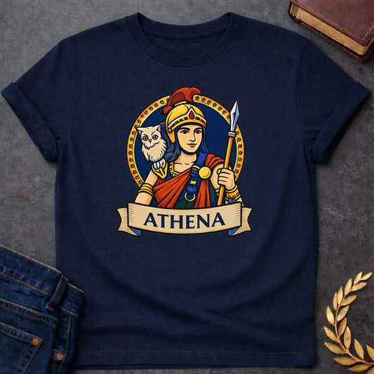 Navy unisex t-shirt laid flat, featuring a colorful Greek mythology badge graphic of Athena in a golden helmet holding a spear, with a white owl on her shoulder, above a banner reading "ATHENA"