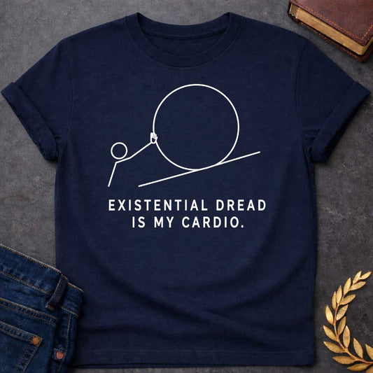 Navy T-Shirt with a minimalist white graphic design. It features a simple line-art illustration of a stick figure pushing a large circle up a diagonal line, depicting a humorous take on the myth of Sisyphus. Below the illustration, the white text reads: "EXISTENTIAL DREAD IS MY CARDIO."