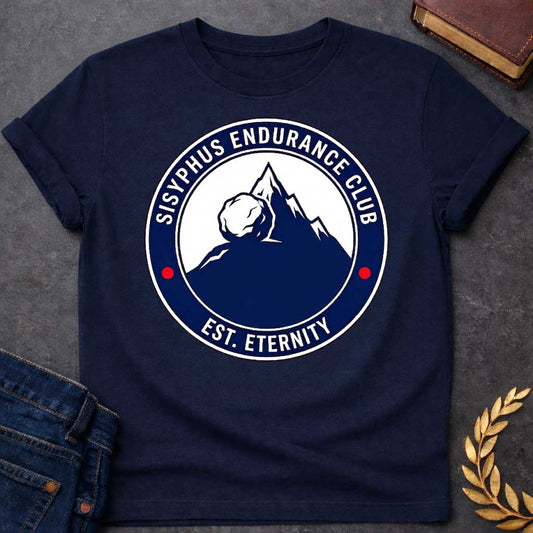 Navy T-Shirt with a circular, emblem-style graphic design. The center features a dark blue silhouette of a mountain with a large boulder resting near the peak. Surrounding this illustration is a dark blue ring with white text that reads "SISYPHUS ENDURANCE CLUB" arched at the top and "EST. ETERNITY" at the bottom, with two small red dots separating the text on the sides.