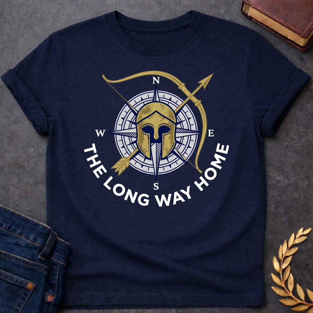 Navy T-Shirt with a logo design combining Greek warrior imagery with nautical navigation elements. A weathered gold Corinthian helmet overlays a navy blue and white compass rose showing cardinal directions (N, S, E, W). A golden bow and arrow cross diagonally behind. Text reading 'THE LONG WAY HOME' curves around the bottom in navy blue. References Odysseus's epic journey in Homer's Odyssey, blending ancient Greek military symbolism with maritime wayfinding to evoke adventure, perseverance, and the voyage h