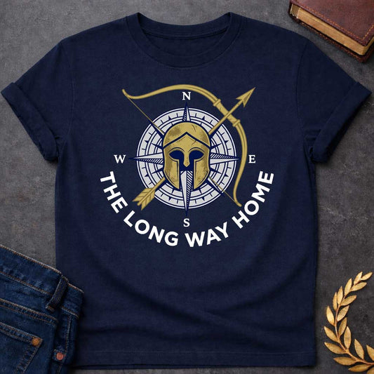 Navy T-Shirt with a logo design combining Greek warrior imagery with nautical navigation elements. A weathered gold Corinthian helmet overlays a navy blue and white compass rose showing cardinal directions (N, S, E, W). A golden bow and arrow cross diagonally behind. Text reading 'THE LONG WAY HOME' curves around the bottom in navy blue. References Odysseus's epic journey in Homer's Odyssey, blending ancient Greek military symbolism with maritime wayfinding to evoke adventure, perseverance, and the voyage h