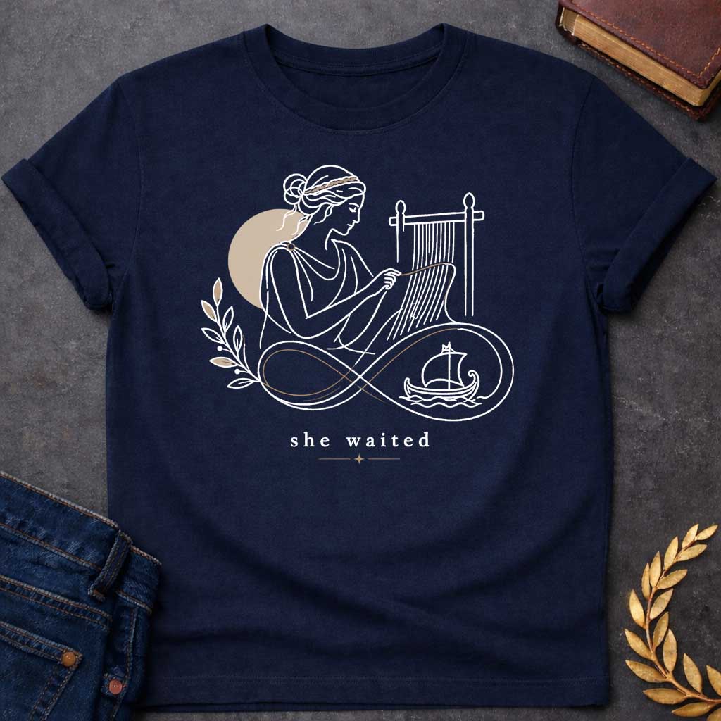 Navy T-Shirt with a Minimalist line art of Penelope weaving at a loom, wearing classical Greek robes with braided hair. Rendered in elegant black linework with tan accents. An infinity symbol flows from the loom, incorporating an olive branch and Greek ship, symbolizing endless waiting for Odysseus. Text reads 'she waited' in serif font with decorative star. Gentle design honoring Penelope's faithful devotion and patience during her husband's 20-year absence.