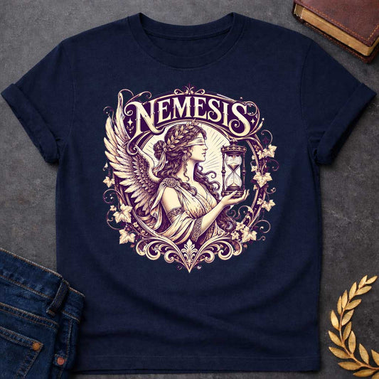 Navy T-shirt with an Ornate Victorian-style illustration of Nemesis, the Greek goddess of divine retribution, rendered in purple and cream. She wears an ornate headband, flowing robes, and large detailed wings. She holds an hourglass symbolizing time and inevitability. Elaborate Art Nouveau decorative frame features scrolling flourishes, ivy leaves, and flowers surrounding the figure. Ornamental typography reads 'NEMESIS' at top in elegant serif lettering. References the goddess who ensures karmic justice a