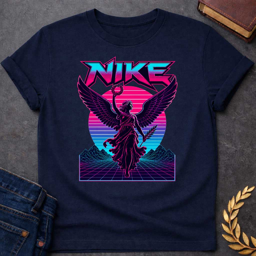 Navy T-shirt with a Vaporwave-style illustration of Nike, the Greek goddess of victory, rendered in neon magenta and cyan. She wears flowing robes with large detailed wings, holding a laurel wreath and palm frond. Bold angular text 'NIKE' appears above in magenta lettering. Geometric mountains and grid landscape create a synthwave aesthetic. Horizontal gradient bands in magenta, purple, and cyan evoke 1980s digital design. Blends classical mythology with modern vaporwave art.