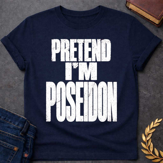 Navy t-shirt with a Pretend I’m Poseidon Greek mythology design featuring bold distressed white typography on a transparent background. The stacked text reads “PRETEND I’M POSEIDON” in a rugged vintage block font, creating a humorous design inspired by Poseidon, the Greek god of the sea, storms, earthquakes, and horses.