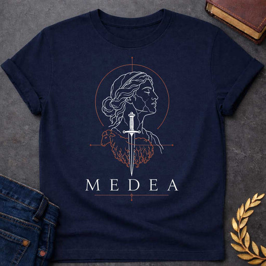 Navy T-shirt with a Minimalist line art portrait of Medea in classical profile with wavy hair. A black sword pierces through her head and neck. Red geometric elements form a crown above and a coiled dragon below, symbolizing her magical power and ancient lineage. Decorative line elements complete the occult aesthetic. Text reads 'Medea' below. Stark black and red design celebrates the legendary Greek sorceress's complexity—beauty, power, and dangerous knowledge intertwined.