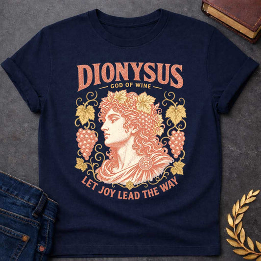 Navy t-shirt with a Vintage Greek mythology design featuring Dionysus, god of wine, wearing a crown of grape leaves and fruit. Ornate grapevines frame the classical portrait in distressed coral and gold, with the text “Dionysus God of Wine” and “Let Joy Lead the Way,” celebrating wine, revelry, and joy.