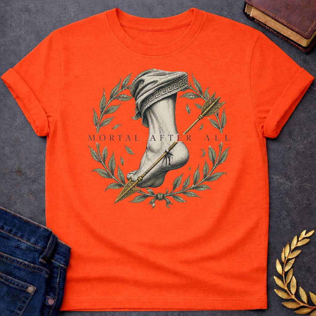 Orange T-Shirt with a classical engraving-style illustration depicting Achilles' fatal vulnerability. A muscular leg and foot rendered in detailed cross-hatching, draped in cloth with Greek key pattern. A golden arrow pierces the heel. Framed by a laurel wreath with olive-green leaves and falling leaves, symbolizing victory and mortality. Elegant serif text reads 'MORTAL AFTER ALL.' Muted tones of cream, grey, olive green, and gold create a somber quality reflecting Achilles' death by arrow to his only vuln