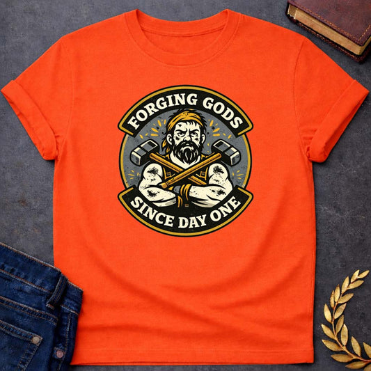 hephaestus forging gods since day one greek mythology adult t shirt featuring blacksmith hammer, forge sparks, fire god symbolism in industrial mythology design