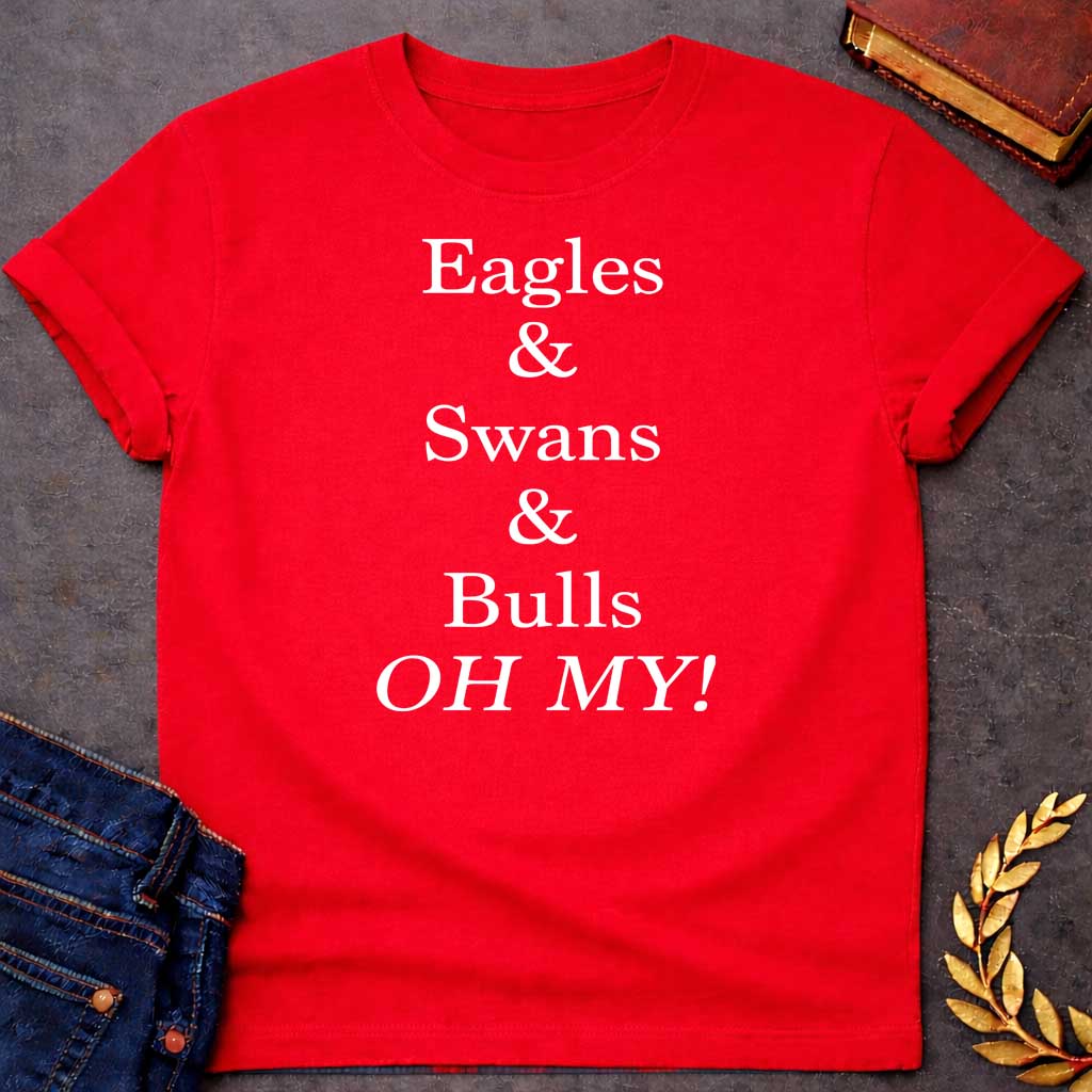 Red T-shirt graphic in white featuring large bold serif text reading "Eagles & Swans & Bulls OH MY!" — a humorous parody of the "Lions and Tigers and Bears, Oh My!" phrase from The Wizard of Oz, referencing the many animal disguises Zeus used for his romantic pursuits in Greek mythology