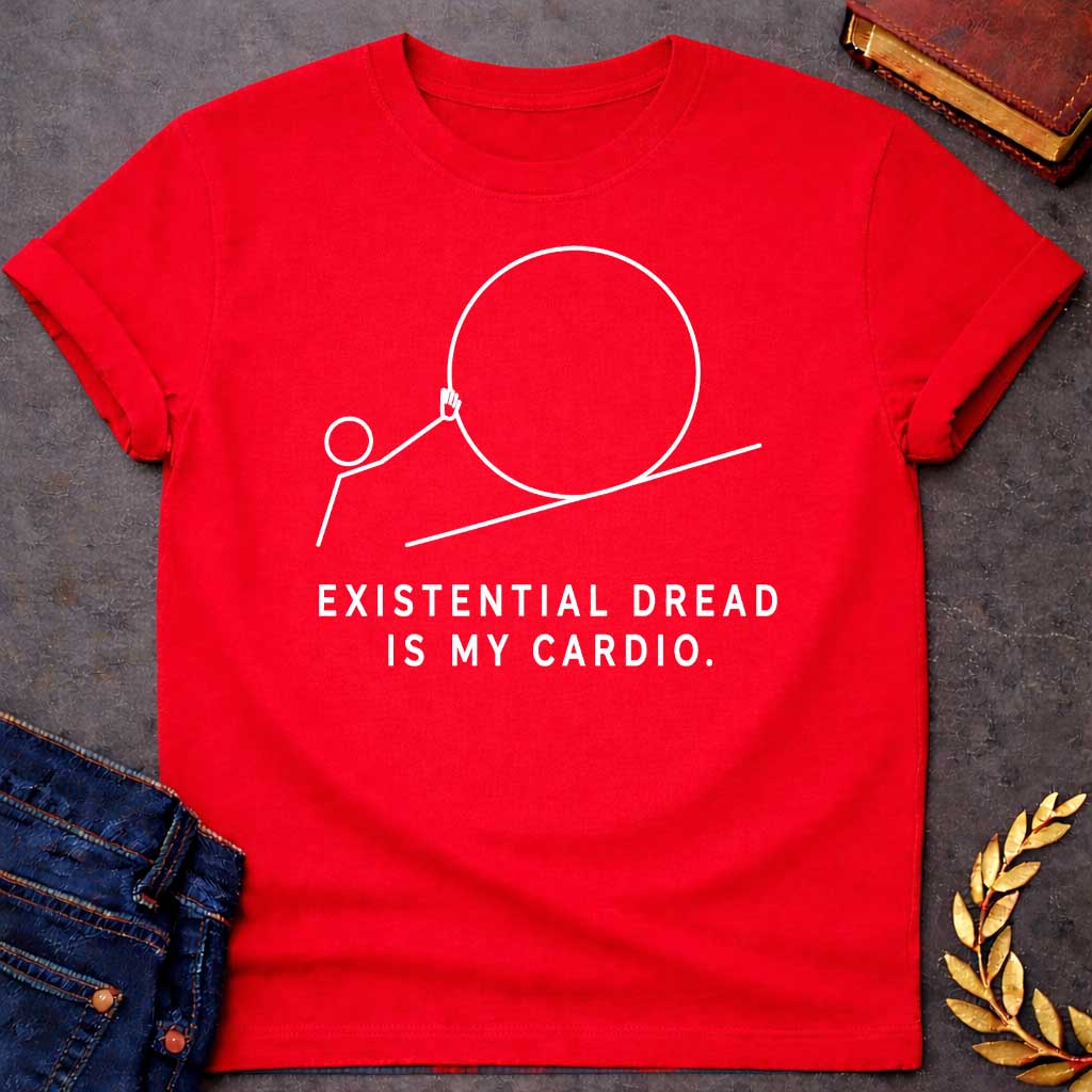Red T-Shirt with a minimalist white graphic design. It features a simple line-art illustration of a stick figure pushing a large circle up a diagonal line, depicting a humorous take on the myth of Sisyphus. Below the illustration, the white text reads: "EXISTENTIAL DREAD IS MY CARDIO."