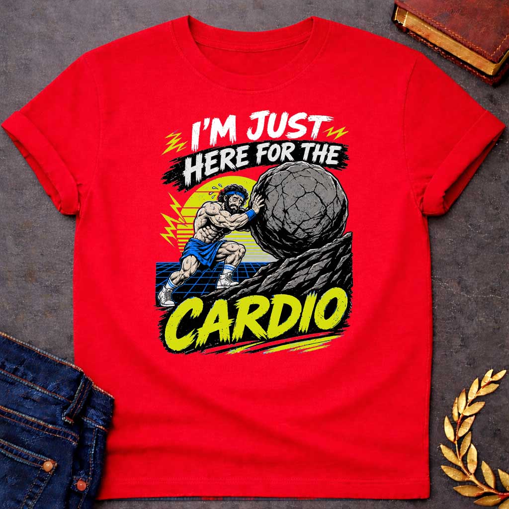 Red T-Shirt with a graphic design featuring a stylized, sweating Sisyphus pushing a massive boulder up a rocky incline. He is wearing gym attire, including a sweatband and high-top sneakers, set against a retro-themed backdrop with a yellow sun and a blue grid landscape. The text "I'M JUST HERE FOR THE" appears at the top in a distressed, brush-stroke style, and the word "CARDIO" is prominently displayed at the bottom in a bold, bright yellow, brush-stroke font