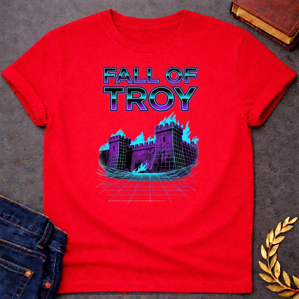Red T-shirt featuring bold chrome 3D outlined text reading "Fall of Troy" above a retro vaporwave-style illustration of the burning city of Troy depicted as a purple halftone castle engulfed in bright teal flames, set on a glowing teal perspective grid floor — referencing the legendary fall of Troy from Greek mythology, rendered in a vivid 1980s retro synthwave aesthetic in purple and teal tones