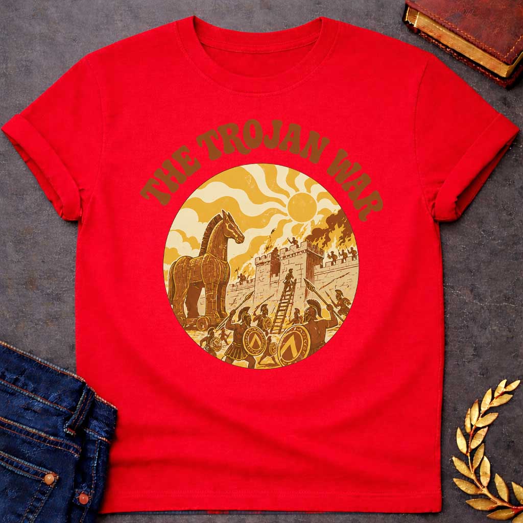 Red T-shirt featuring bold groovy 1970s-style arched brown text reading "The Trojan War" above a circular vintage illustration depicting the siege of Troy — the Trojan Horse stands to the left while Greek warriors with Spartan shields and spears storm the burning walls of Troy using a ladder, under a stylized wavy sun, rendered in a warm retro palette of golden yellow, burnt orange, and brown tones