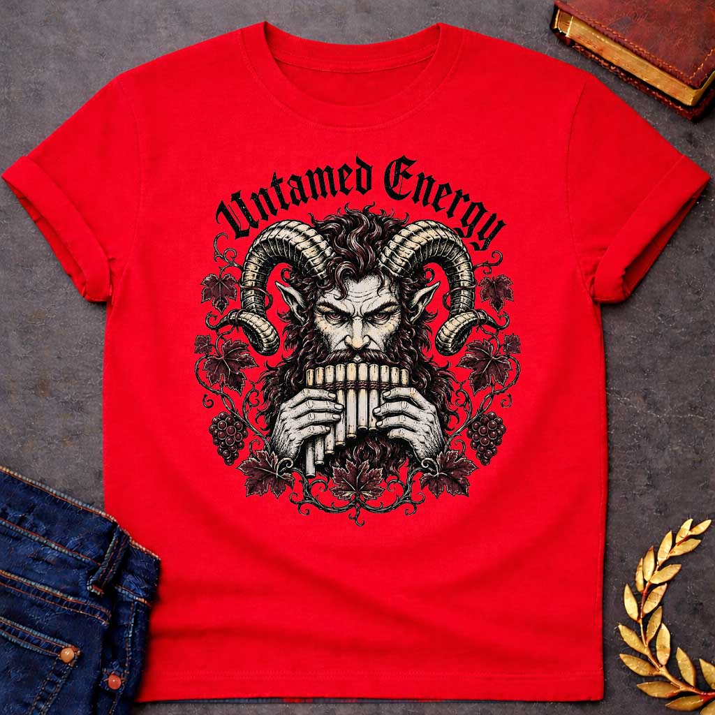 Red T-shirt with a heavy metal style t-shirt graphic. It features a powerful, intense satyr or Pan figure with large, curling ram horns playing a pan flute. His fierce face is framed by a circular wreath of detailed, twisting grapevines, deep purple-red autumn leaves, and clusters of grapes. Arched directly above the illustration, the phrase "Untamed Energy" is written in a bold, black gothic font