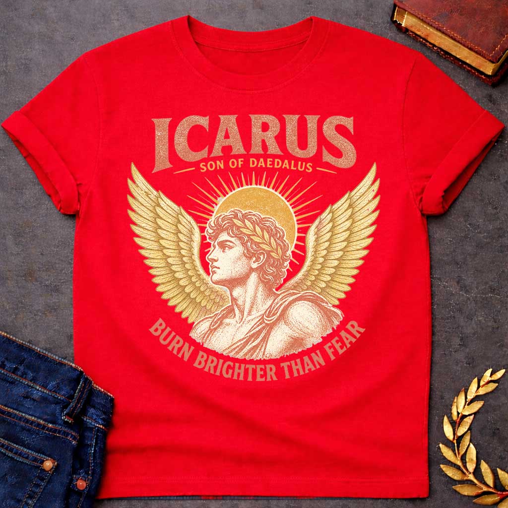 Red t-shirt with a Vintage Icarus Greek mythology design featuring the son of Daedalus in profile with large golden wings, a laurel crown, and a radiant sun behind him. Distressed coral and gold artwork gives the design an antique classical look, with bold text reading “Icarus Son of Daedalus” and “Burn Brighter Than Fear.”