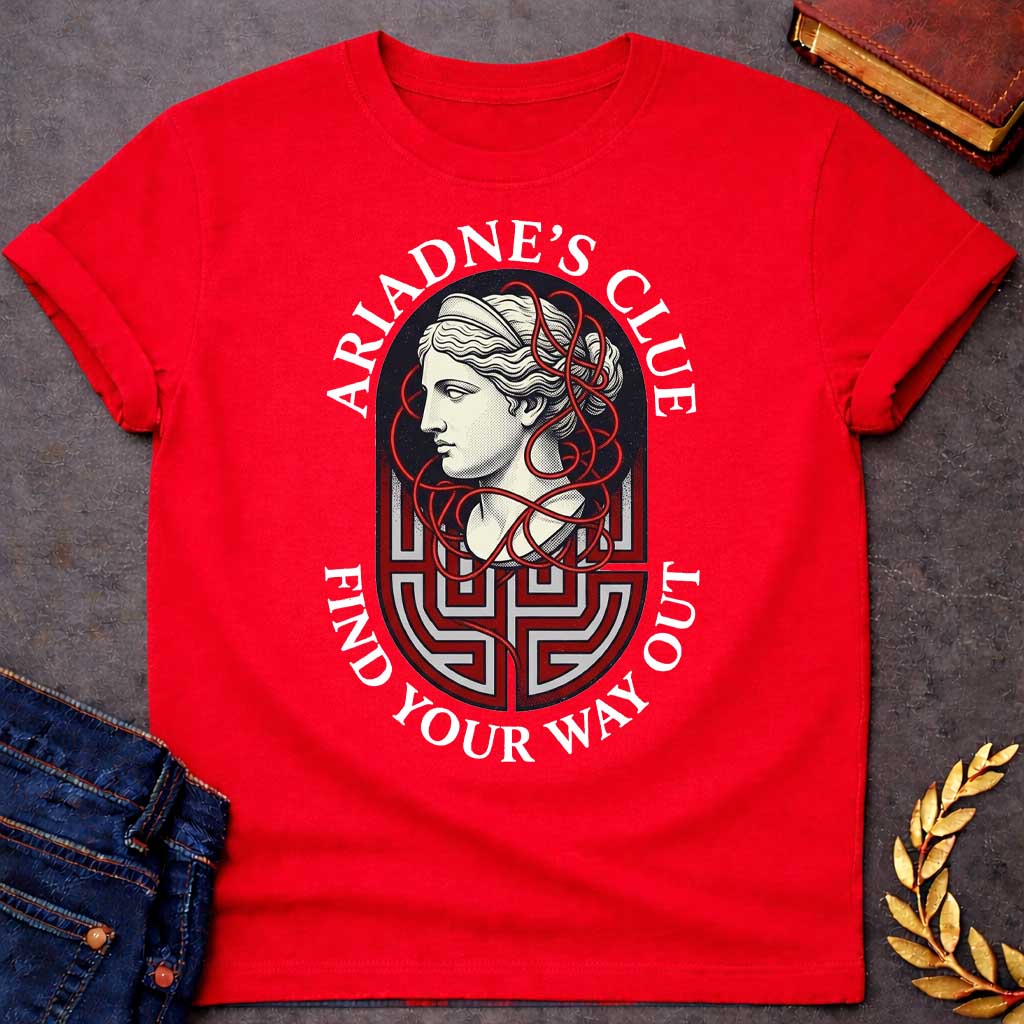 Red T-shirt with A Classical portrait of Ariadne rendered in cream and red showing her in profile with wavy hair. Red thread winds decoratively around her head and neck, referencing her legendary ball of thread that guided Theseus through the labyrinth. A Greek key maze pattern in red and gray forms the base below her portrait. Text reads 'Ariadne's Clue' above and 'Find Your Way Out' below. Celebrates the mythological heroine's wisdom and the power of guidance through impossible challenges