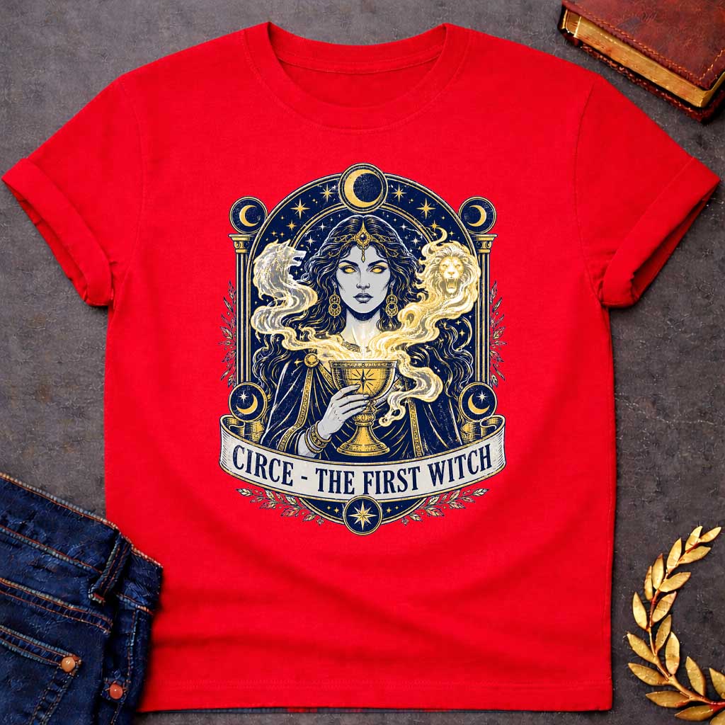Red T-shirt with a Mystical tarot-style portrait of Circe, the first witch from Greek mythology, rendered in navy blue and gold. She displays golden glowing eyes and magical hair infused with light energy. Twin lion heads flank her head symbolizing divine power. She holds an ornate golden goblet overflowing with luminous magic. Moon phases in crescent form circle her ethereal figure. Ornate architectural frame with columns and celestial decorations. Gold stars scatter throughout. Banner reads 'Circe - The F