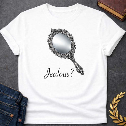 White T-shirt graphic featuring an ornate silver hand mirror with an oval reflective face, decorated with intricate baroque-style scrollwork, floral motifs, and beaded detailing along the frame and handle, set against a solid black background. Associated with Aphrodite, Greek Mythology Goddess of Love